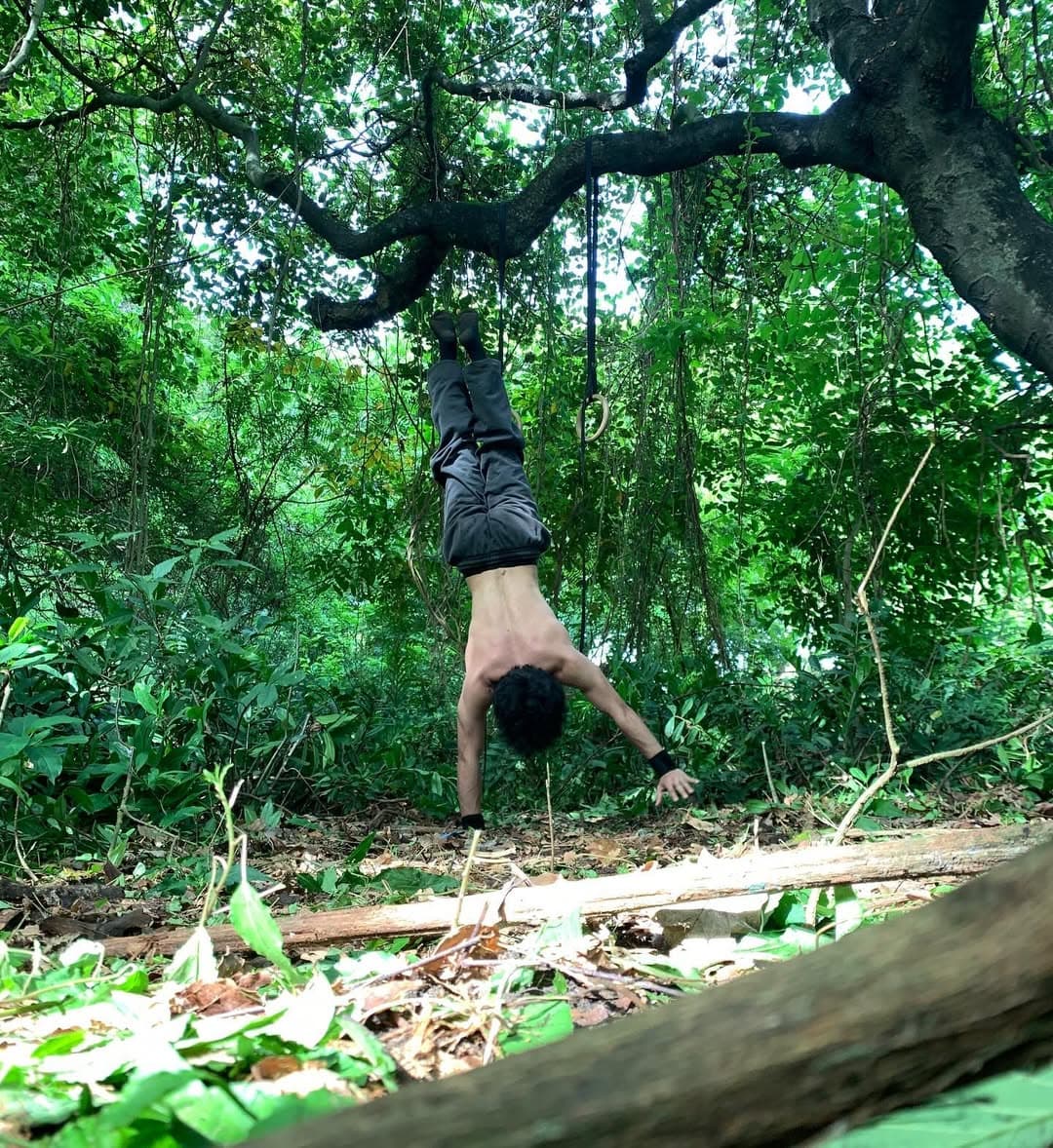 Handstand practice in the forest