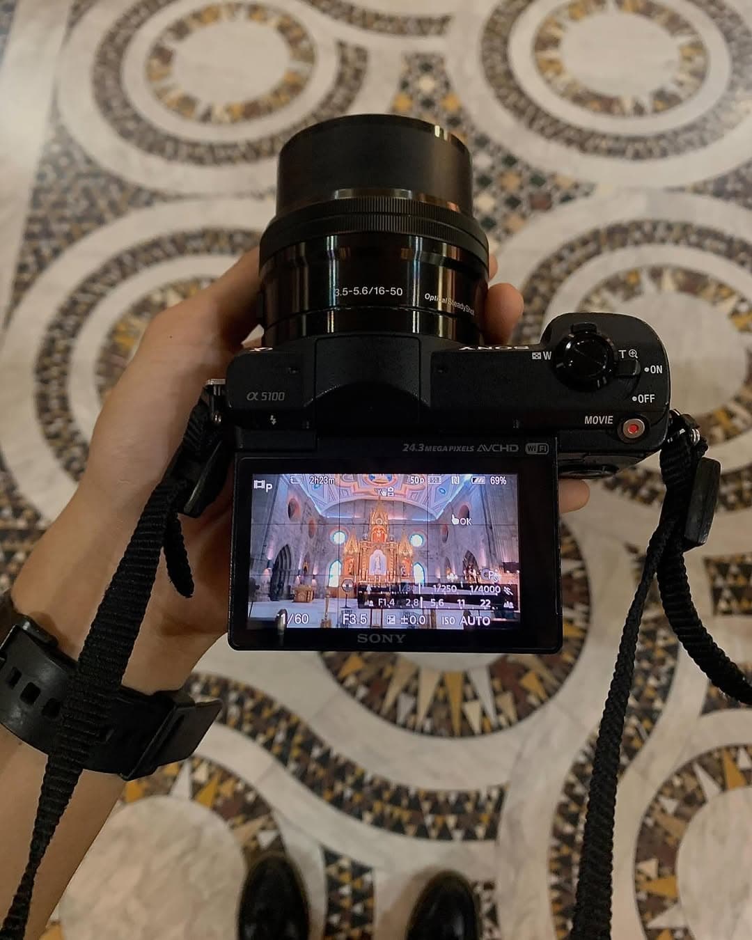 Holding camera at church